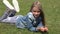 Child Playing in Grass, Kid Smiling at Camera Girl Face Laughing Outdoor in Park