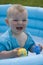 Child playing in the inflatable pool