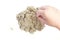 Child playing with kinetic sand. Hand of the child in the sand c