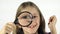 Child Playing with Magnifying Glass, Girl Eyes in Eyeglass, Kid Make Faces