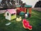 Child playing in outdoor small playground , Oman