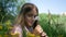 Child Playing in Park, Girl Blowing Dandelion Flowers on Meadow Outdoor Nature