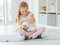 Child playing with retriever puppy