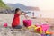 Child playing sand beach, on the beach on summer holidays. Children building a sandcastle at sea