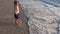 Child Playing in Sea Waves, Kid on Beach, Girl Running on Seashore in Sunset