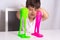 Child playing with slime. Kids squeeze and stretching slime.