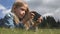 Child Playing Smartphone Outdoor in Park, Kid use Tablet on Meadow Girl in Grass