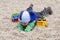 Child playing in stones pebbles at playground