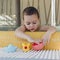 Child playing in swimming pool