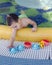 Child playing in swimming pool