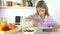 Child Playing Tablet, Kid Eating Cereals and Milk at Breakfast, Girl in Kitchen