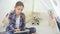 Child Playing Tablet in Playroom Girl Writing Homework for School Kid Playground