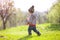 A child plays with a Frisbee outdoors.