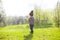 A child plays with a Frisbee outdoors.