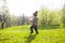 A child plays with a Frisbee outdoors.