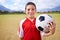 Child, portrait and soccer player on field, sports and confidence for match and game. Happy boy, face and ready for