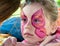 Child preschooler with face painting