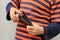 Child, preschooler, primary school student, holding a leather wallet, hands close-up