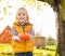 Child with pumpkin