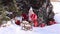 A child puts gifts in a sleigh at Christmas.