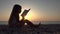 Child Reading Book on Beach, Kid at Sunset, Little Girl on Coastline, Ocean View