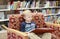 Child reading a library book on a couch