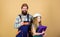 Child renovation room. Family remodeling house. Home remodel and renovation. Father and daughter hard hat helmet uniform