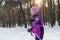Child rides on skis. forest in winter winter ski child