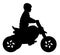 Child riding an electric motorcycle car silhouette.