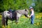 Child riding a small horse