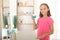 the child is rinsing the mouth with a mouthwash. Oral health in children