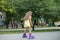 Child rollerblading fast at skate park. Concept of an active lifestyle, hobbies and childhood