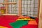 Child room with sport section, playing space, wooden construction for gymnastics, climbing. Rubber mats, carpets for feet. Close