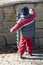 Child at rubbish bin