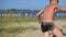 Child running on beach sand