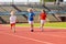 Child running in stadium. Kids run. Healthy sport