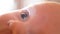 Child`s eye macro newborn baby close up shot