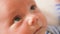 Child`s eyes macro newborn baby look close up shot