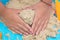 Child`s hand close up playing kinetic sand