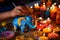 Child\\\'s hand painting an elephant figurine, adding a personal touch to Diwali gift