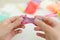 Child`s hands with colored plasticine.