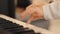 Child\'s hands playing piano