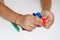 Child`s hands sculpt figures from soft colorful plasticine. Educational and entertaining classes with children. Close-up