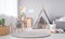 A child\\\'s playroom with a teepee tent