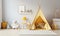 A child\\\'s playroom with a teepee tent