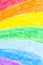 Child\'s rainbow crayon drawing