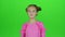 Child is sad, she was riddled with unpleasant news. Green screen