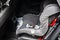 Child safety seat in the back of the car. Baby car seat for safety. Car interior. Car detailing. Child safety concept.