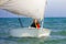 Child sailing. Kid learning to sail on sea yacht