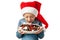 A child in a Santa hat adores sweets. A plate full of assorted chocolates in the hands of a little girl